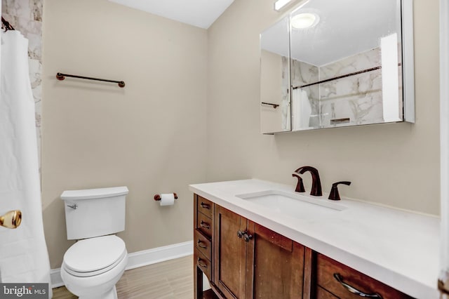 bathroom with vanity, curtained shower, toilet, and wood-type flooring