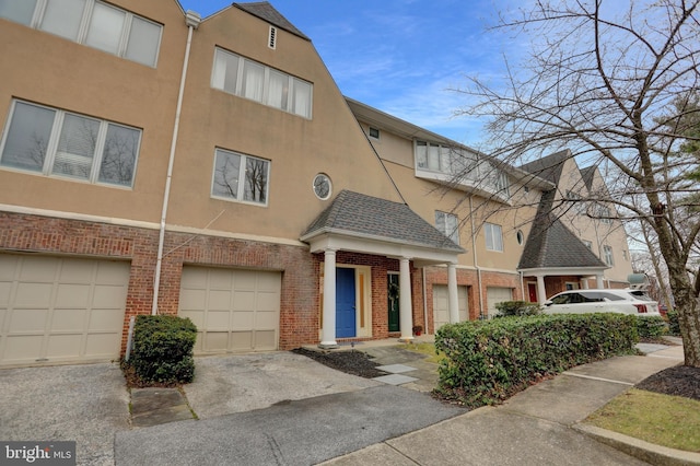 view of building exterior featuring a garage