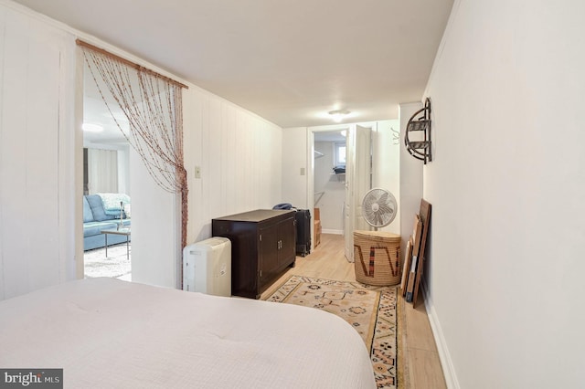 bedroom featuring light wood-type flooring