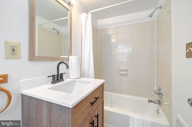 bathroom with vanity and shower / bath combo with shower curtain