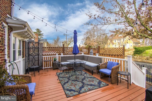 deck featuring an outdoor living space