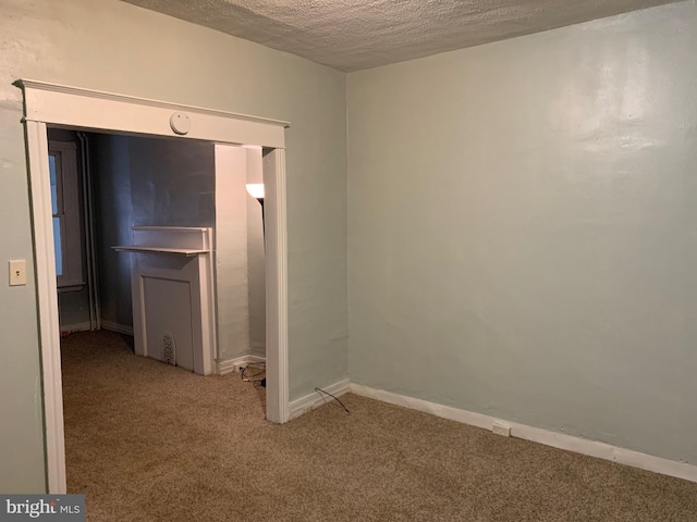 interior space featuring a textured ceiling