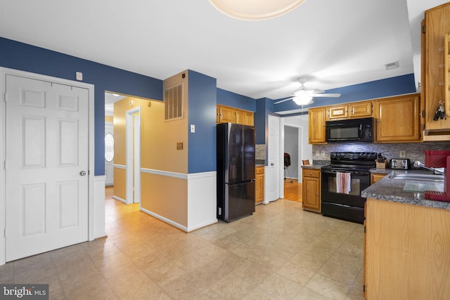 kitchen with black appliances, ceiling fan, sink, and tasteful backsplash