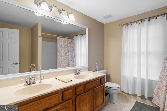 bathroom with tile patterned flooring, vanity, toilet, and a shower with shower curtain