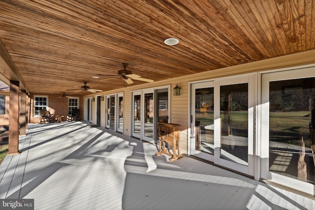 view of patio featuring ceiling fan