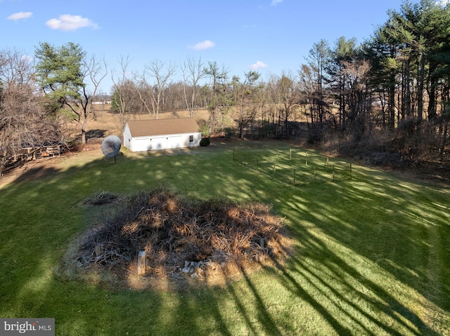 view of yard with a rural view