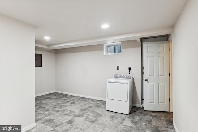 laundry room featuring washer / dryer and electric panel