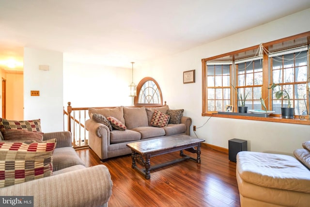 living room with dark hardwood / wood-style floors