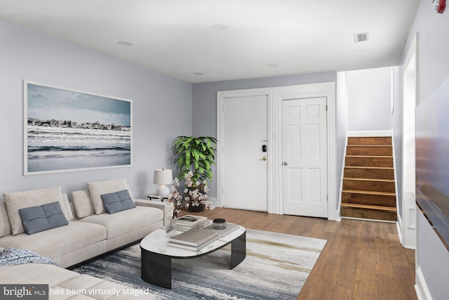 living room with hardwood / wood-style floors