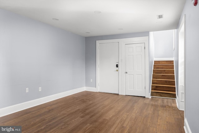 foyer entrance with wood-type flooring