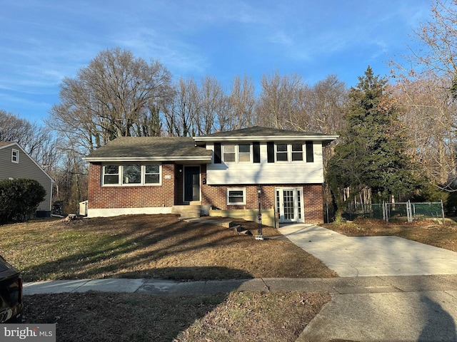 split level home with a front yard