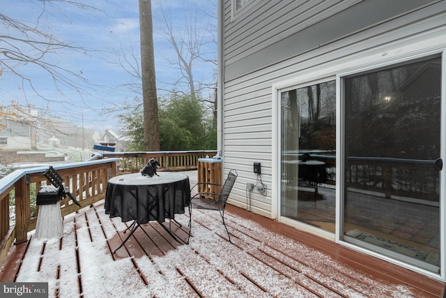 view of snow covered deck