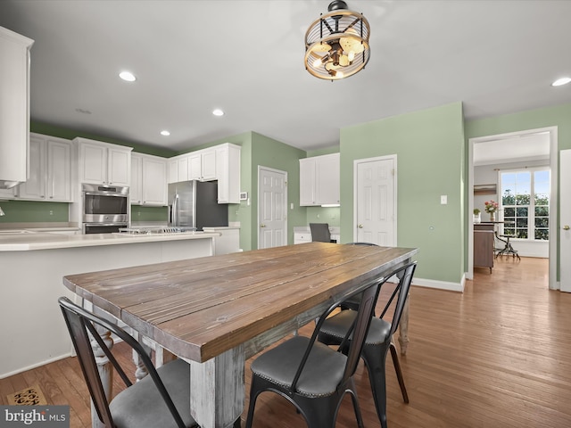 dining room featuring hardwood / wood-style floors