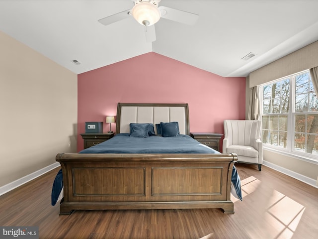 bedroom with lofted ceiling, ceiling fan, and hardwood / wood-style flooring