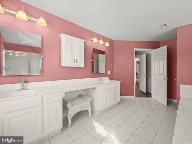 bathroom featuring vanity and tile patterned floors