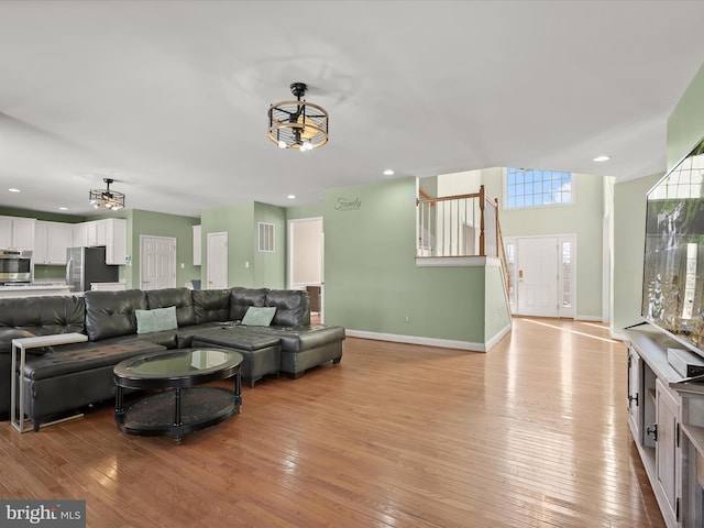 living room with light hardwood / wood-style floors