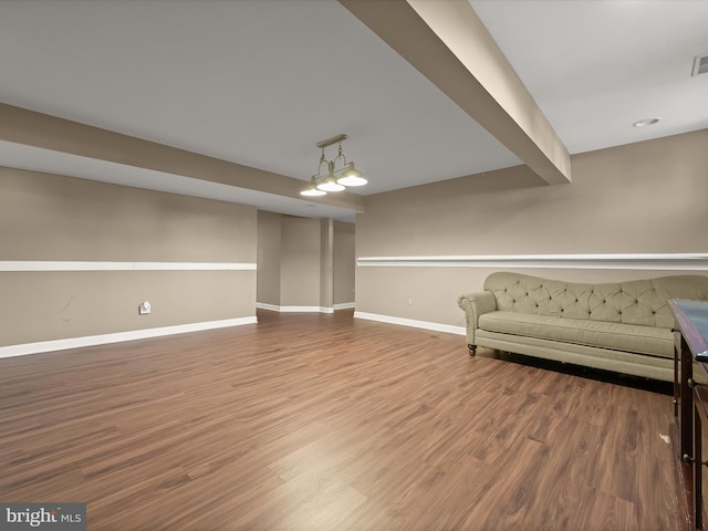 unfurnished room with wood-type flooring