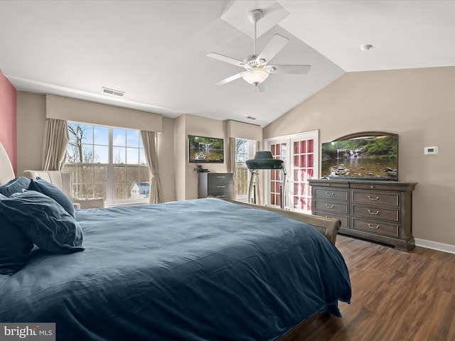 bedroom featuring vaulted ceiling, dark wood-type flooring, and ceiling fan