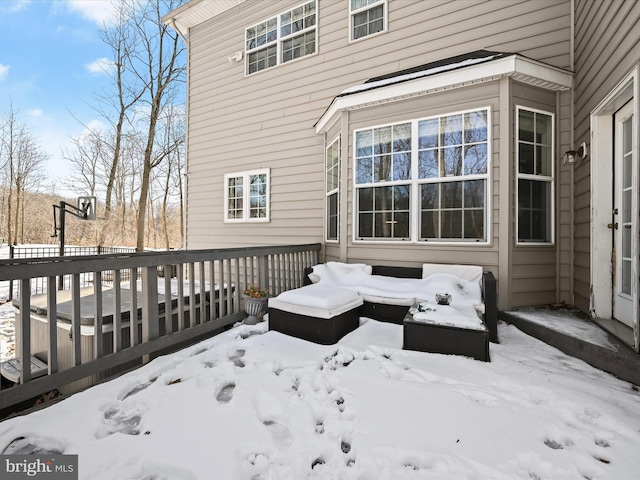 view of snow covered deck