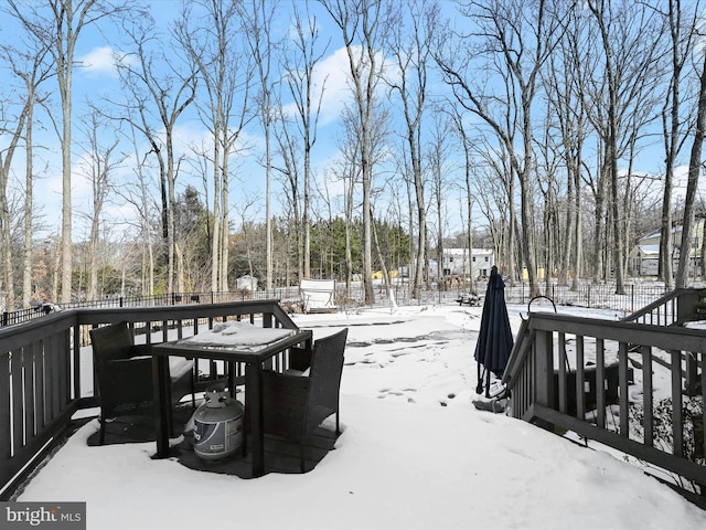 view of snow covered deck