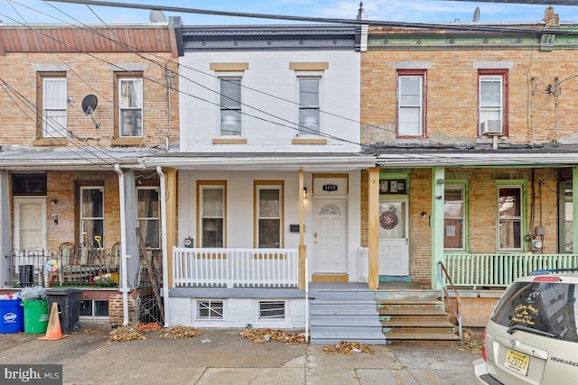 multi unit property featuring a porch