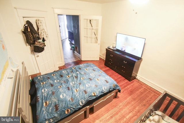 bedroom featuring hardwood / wood-style floors