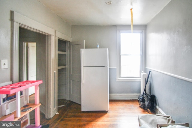 interior space with hardwood / wood-style flooring