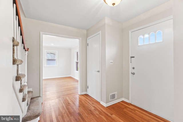 entrance foyer featuring light wood-type flooring