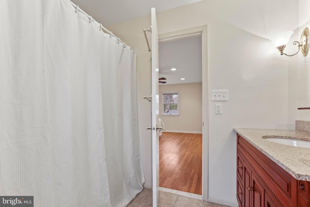 bathroom with vanity and tile patterned floors