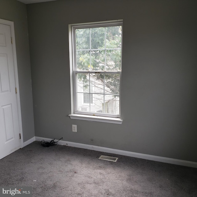 empty room with carpet floors