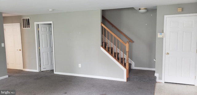 stairway with carpet flooring