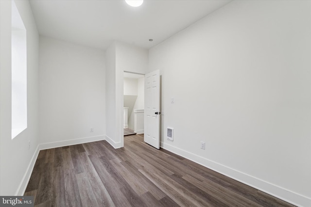 unfurnished bedroom featuring hardwood / wood-style floors