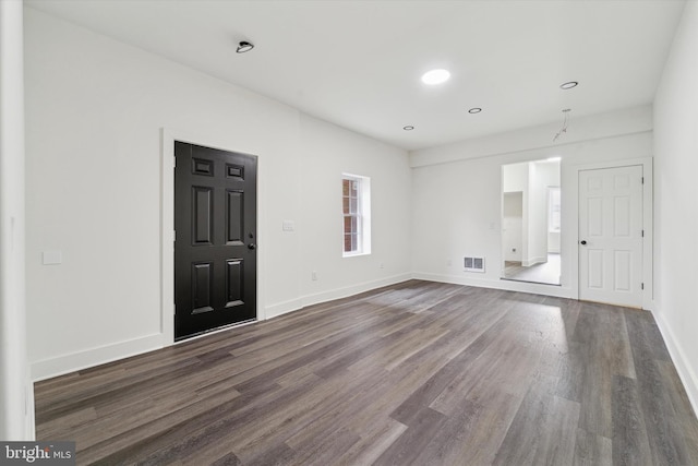 entryway featuring dark wood-type flooring