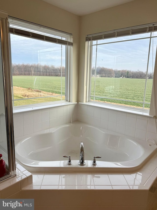 bathroom with a rural view