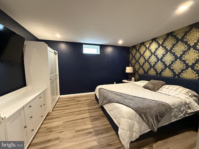 bedroom featuring light hardwood / wood-style floors