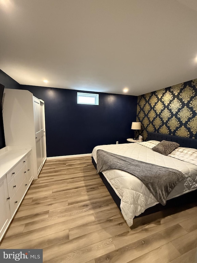 bedroom featuring light hardwood / wood-style floors