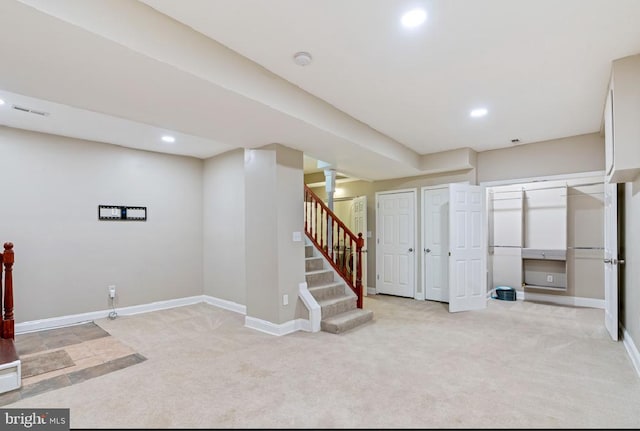 basement with light colored carpet