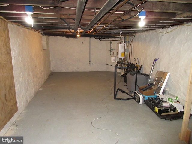 basement featuring water heater