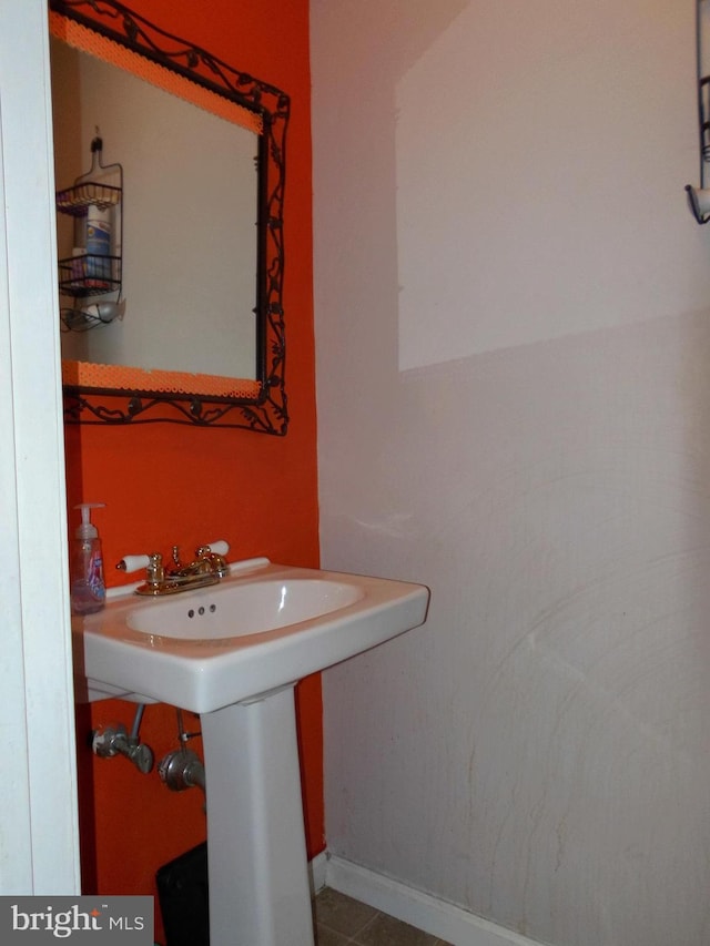 bathroom featuring tile patterned flooring