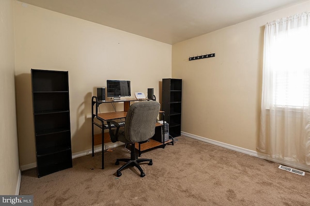 view of carpeted office space