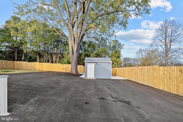 view of patio / terrace with a shed