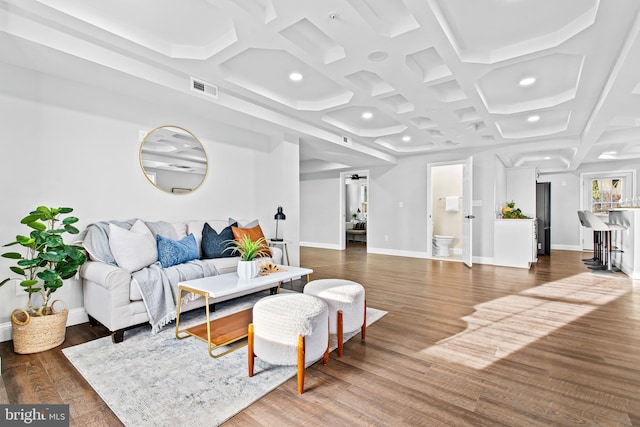 living room with beamed ceiling, dark wood-type flooring, and coffered ceiling