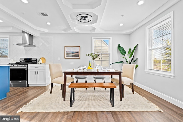 dining area featuring dark hardwood / wood-style flooring