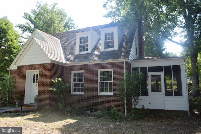 exterior space featuring a sunroom