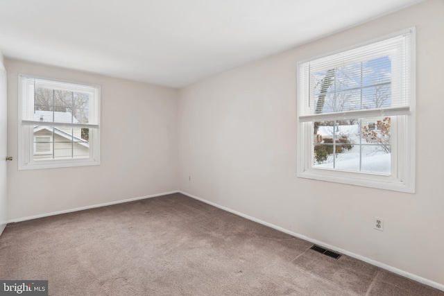 view of carpeted spare room