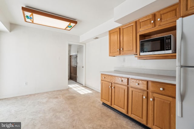 kitchen with white fridge