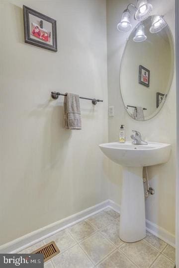 bathroom with tile patterned flooring