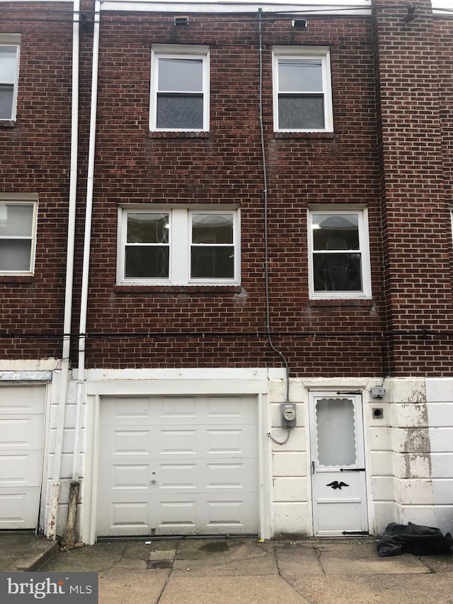 exterior space featuring a garage