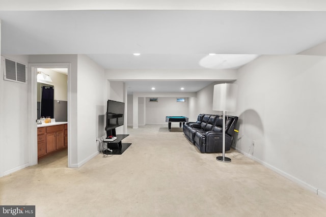 living room featuring light colored carpet and pool table