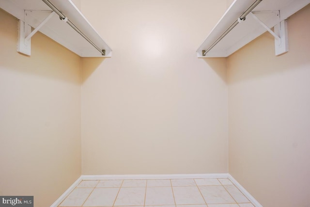 walk in closet featuring light tile patterned floors